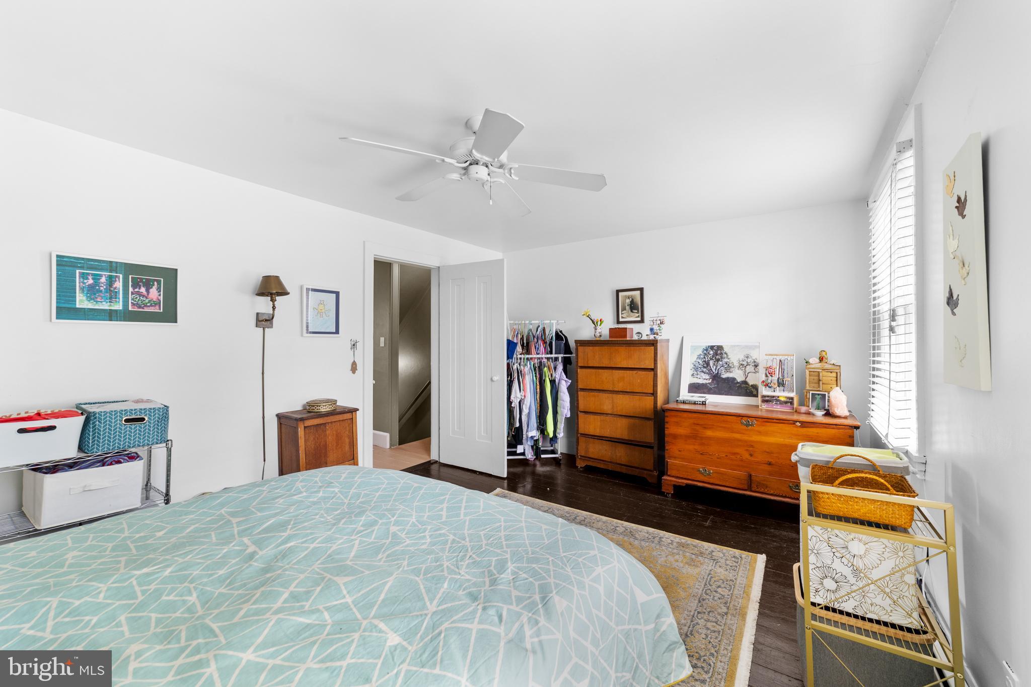 327 East Street Road Kennett Square, PA 19348 - Photo 25 of 43 a bedroom with furniture and a chandelier