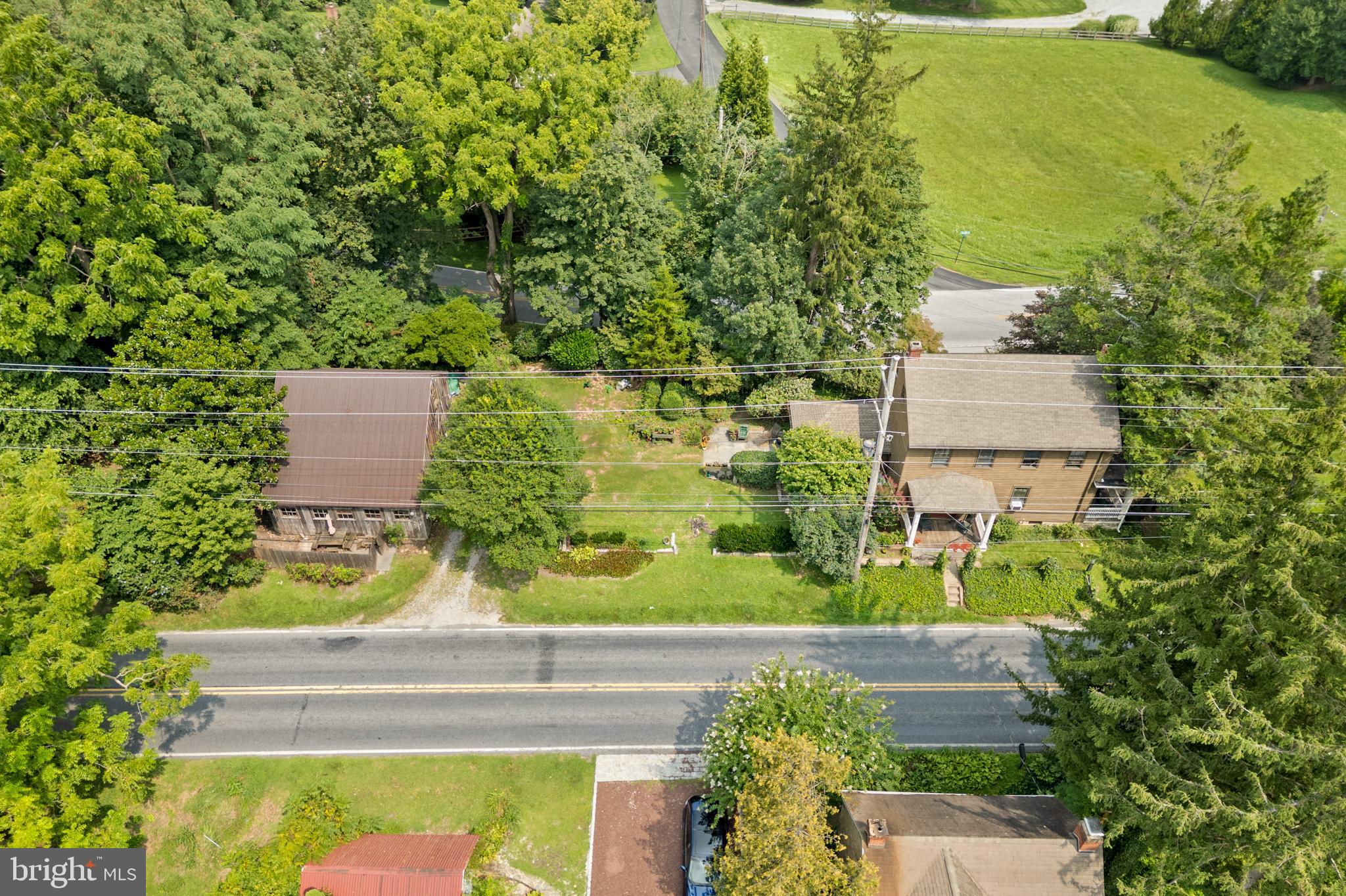 327 East Street Road Kennett Square, PA 19348 - Photo 42 of 43 an aerial view of a house with a garden