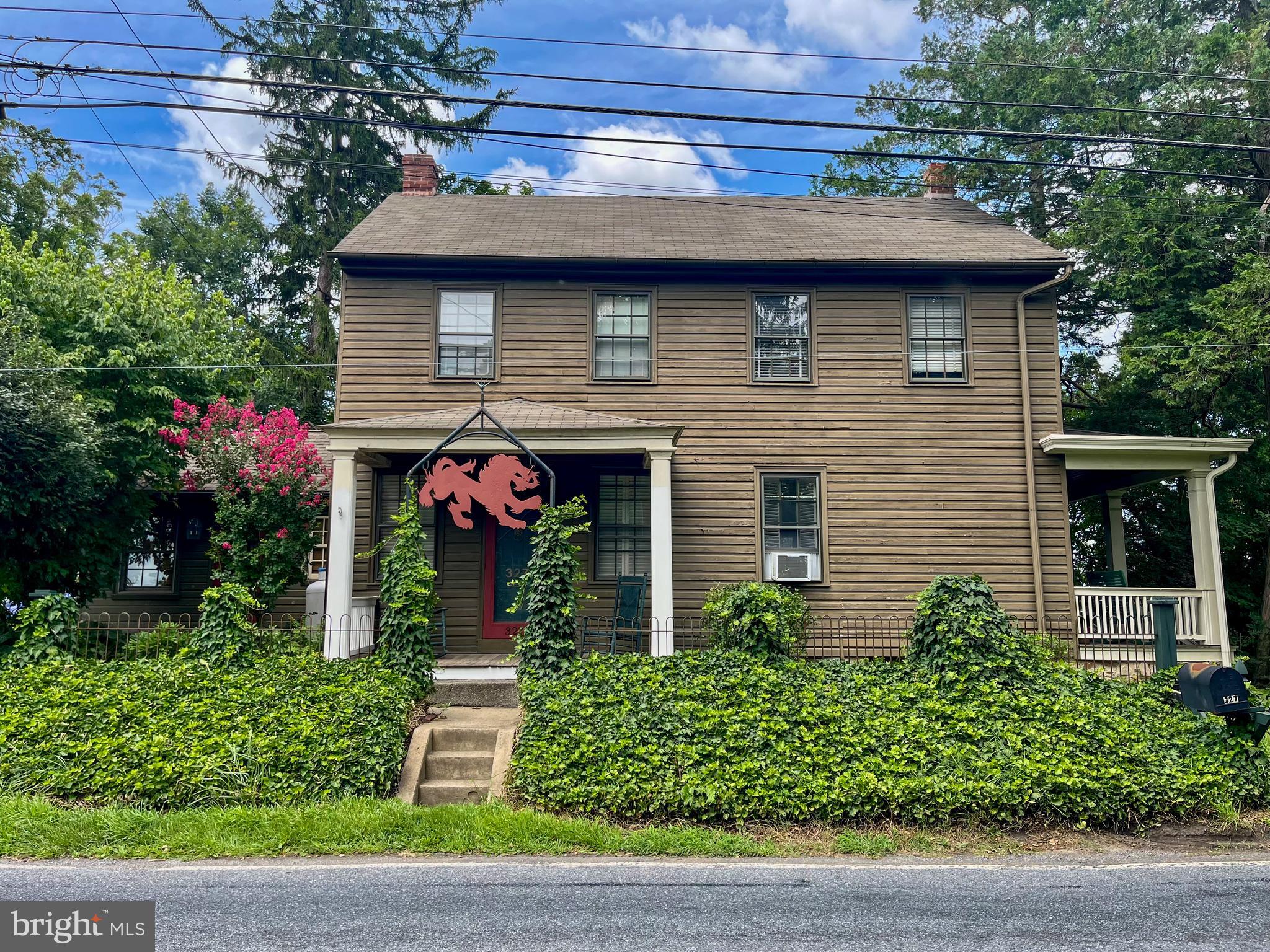 327 East Street Road Kennett Square, PA 19348 - Photo 43 of 43 a front view of a house with garden