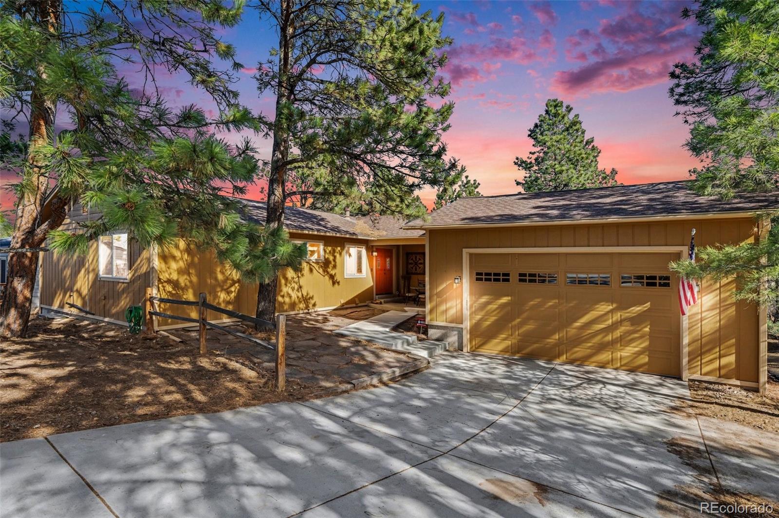 6224 Powell Road Parker, CO 80134 - Photo 1 of 40 a view of a house with a garage
