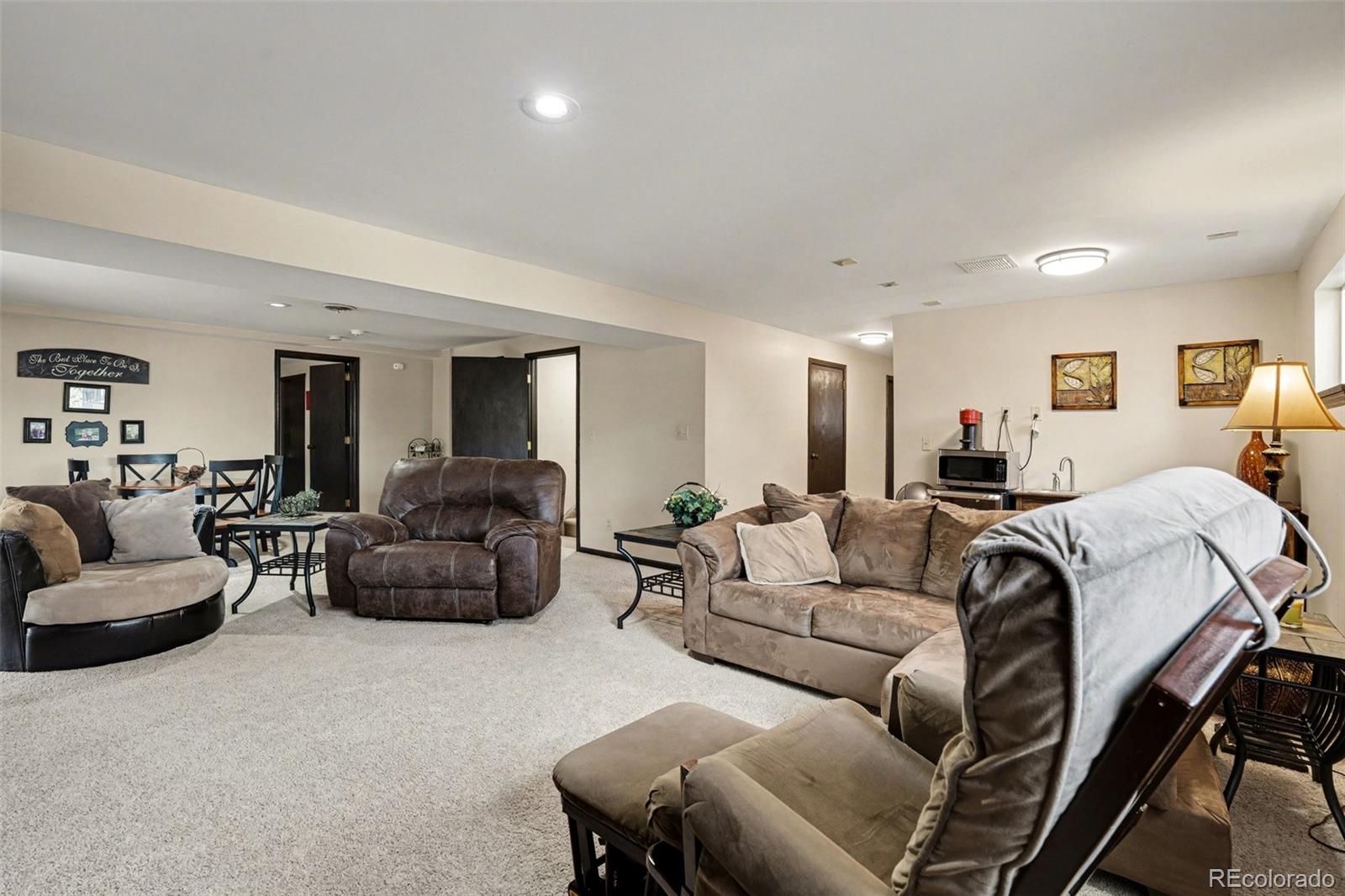 6224 Powell Road Parker, CO 80134 - Photo 20 of 40 a living room with furniture and a couch