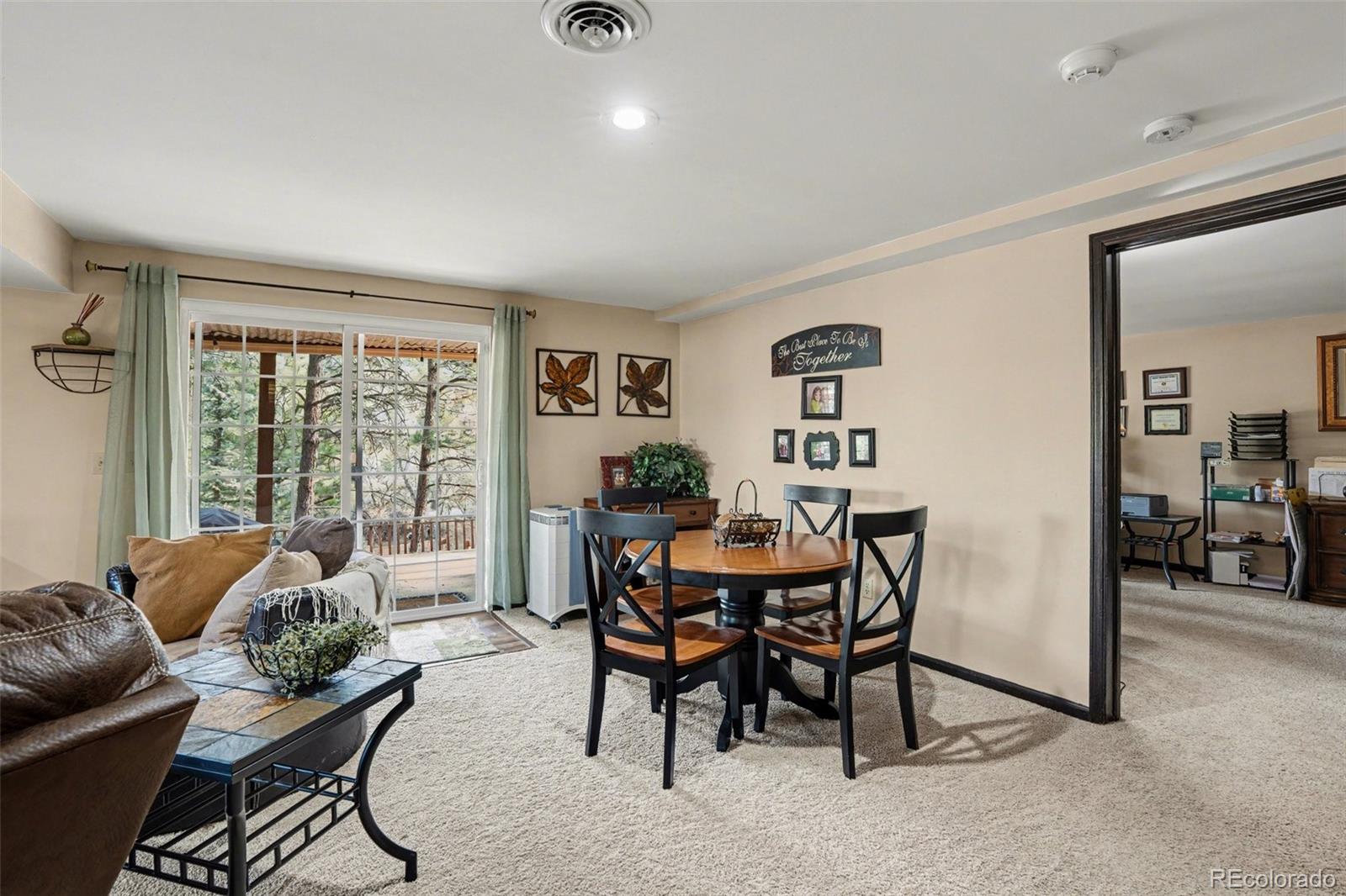6224 Powell Road Parker, CO 80134 - Photo 21 of 40 a living room with furniture and a large window