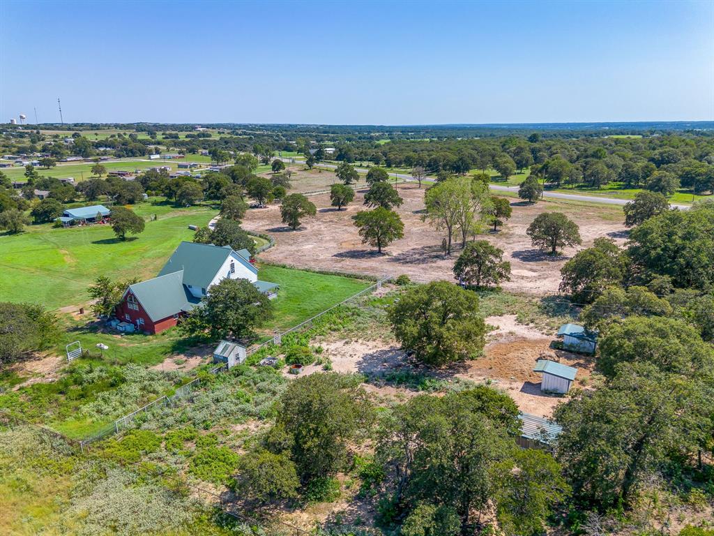 7726 West Highway 199 Springtown, TX 76082 - Photo 13 of 29 a view of a lake with houses in the back