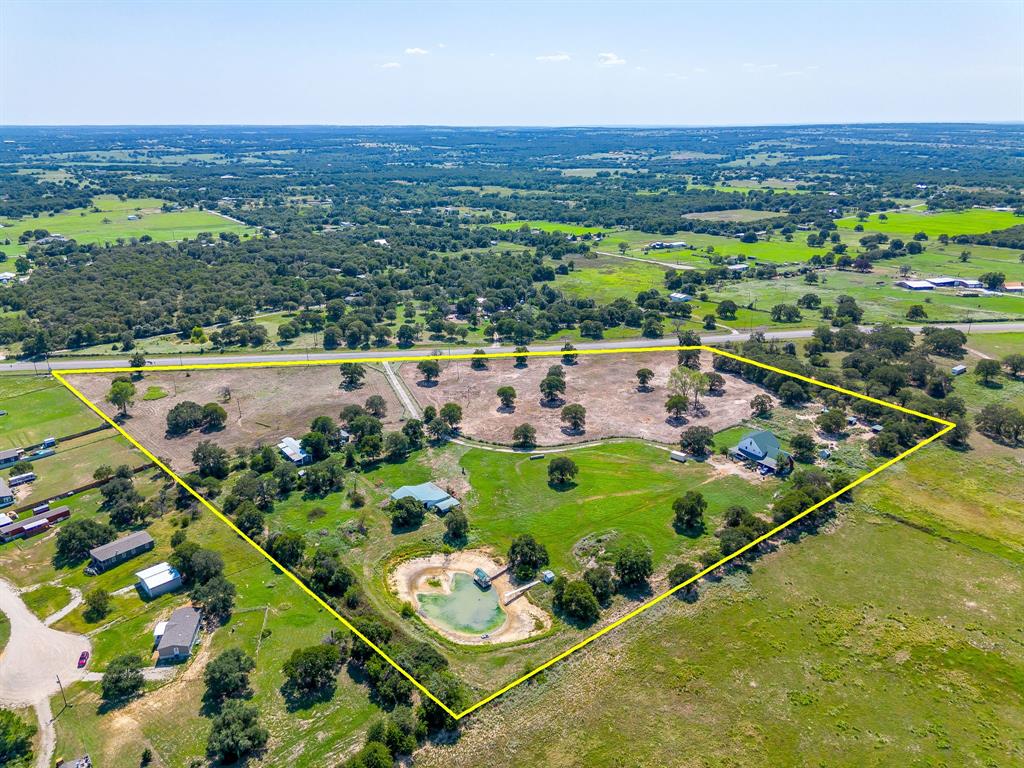 7726 West Highway 199 Springtown, TX 76082 - Photo 20 of 29 an aerial view of a residential houses with outdoor space and city view