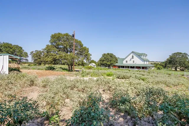 a view of a playground with a yard