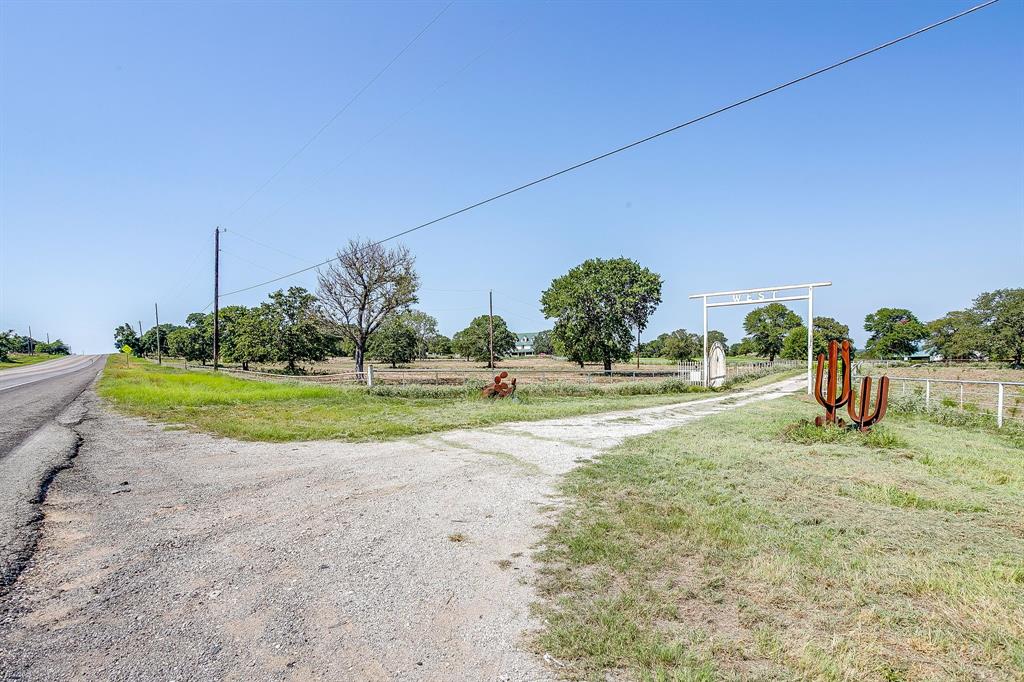 7726 West Highway 199 Springtown, TX 76082 - Photo 7 of 29 a view of a playground with a yard