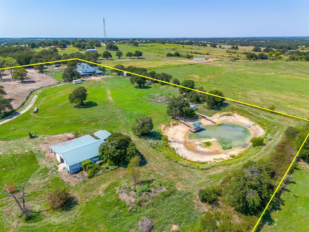 7726 West Highway 199 Springtown, TX 76082 - Photo 10 of 29 a view of a swimming pool and an ocean