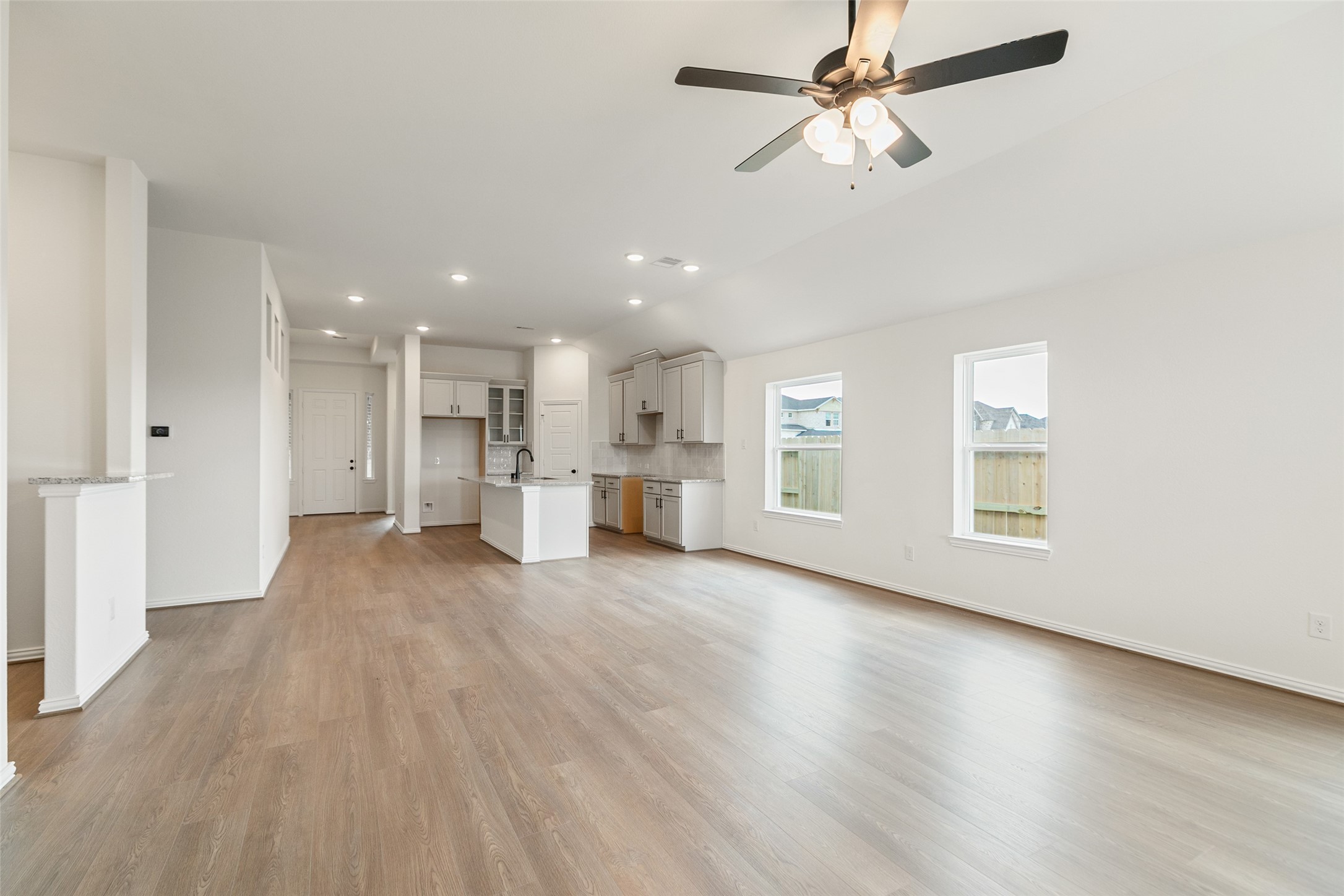 2801 Ruby Laurel Drive Iowa Colony, TX 77583 - Photo 16 of 31 a view of empty room with wooden floor and ceiling fan