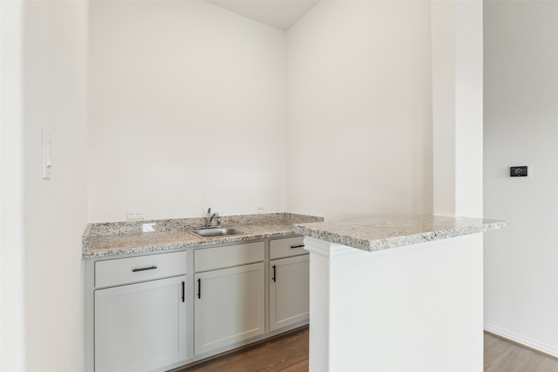 2801 Ruby Laurel Drive Iowa Colony, TX 77583 - Photo 17 of 31 a bathroom with a granite countertop sink and white cabinets