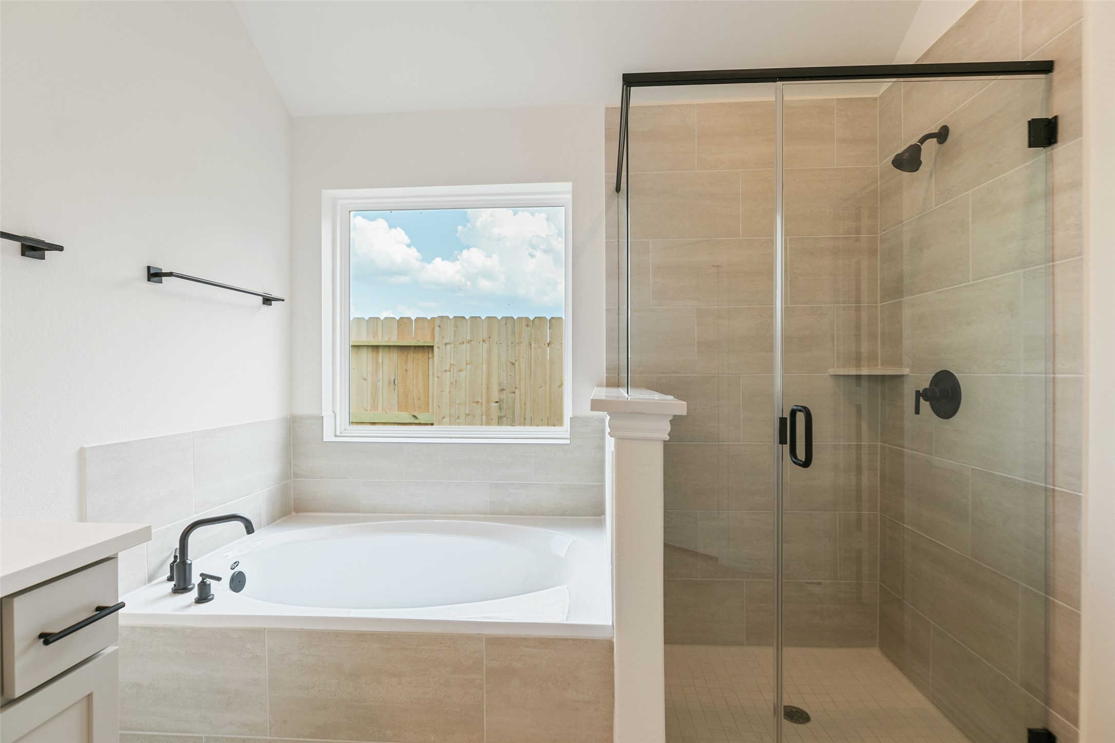 2801 Ruby Laurel Drive Iowa Colony, TX 77583 - Photo 27 of 31 a white bath tub sitting next to a shower