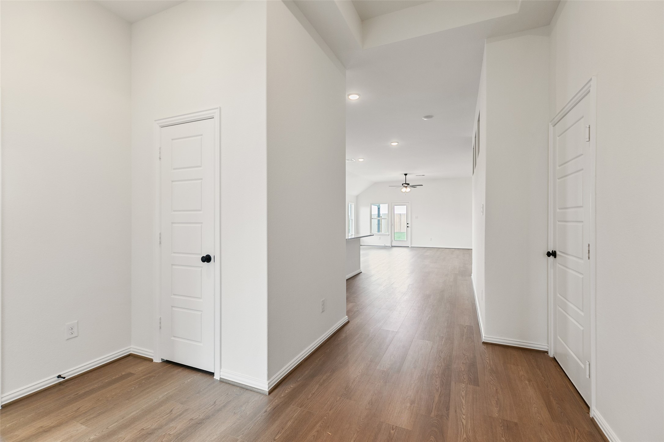 2801 Ruby Laurel Drive Iowa Colony, TX 77583 - Photo 4 of 31 a view of a hallway with wooden floor