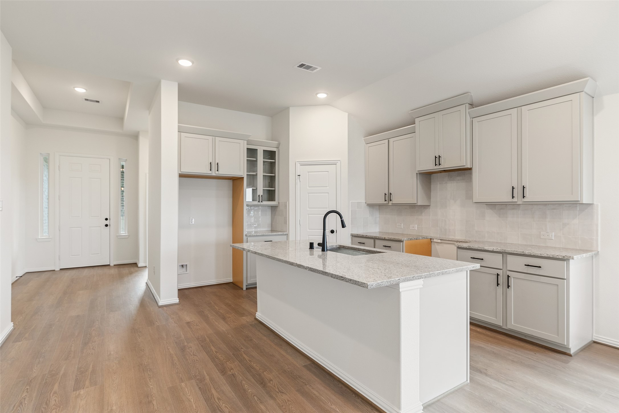 2801 Ruby Laurel Drive Iowa Colony, TX 77583 - Photo 10 of 31 a kitchen with stainless steel appliances granite countertop a sink stove and refrigerator