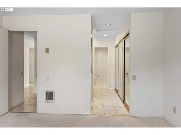 a bathroom with a sink a vanity and a mirror