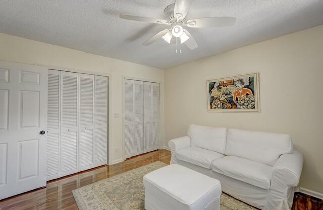 16914 Waterbend Drive, Unit 167 Jupiter, FL 33477 - Photo 25 of 46 a living room with furniture and a rug