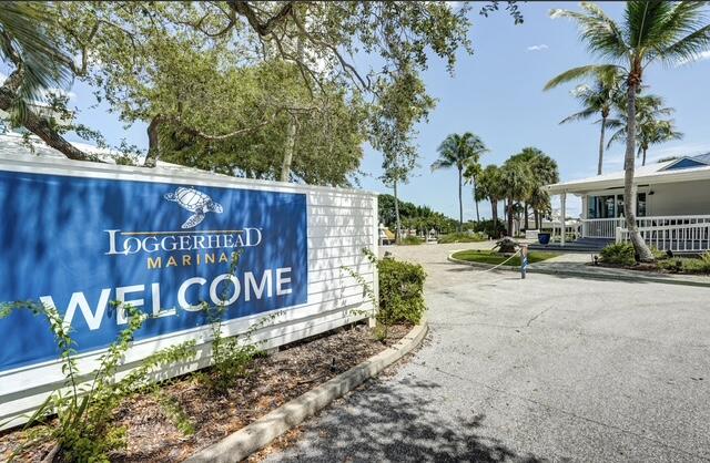 16914 Waterbend Drive, Unit 167 Jupiter, FL 33477 - Photo 32 of 46 a view of outdoor space with garden and trees