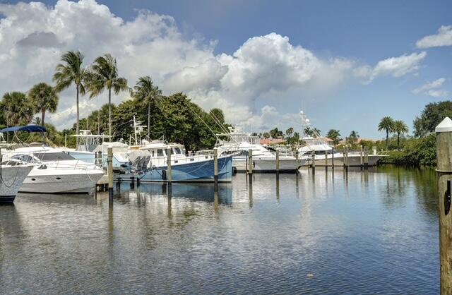 16914 Waterbend Drive, Unit 167 Jupiter, FL 33477 - Photo 33 of 46 a view of a lake with boats in it