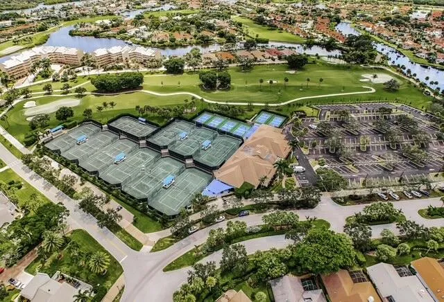 an aerial view of lake residential house with outdoor space and lake view