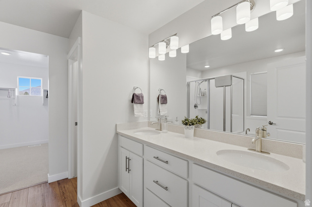 1353 Mapleton Hts Court Mapleton, UT 84664 - Photo 20 of 50 Primary Suite Full bathroom featuring double vanity, a stall shower, dark wood-type flooring, and recessed lighting
