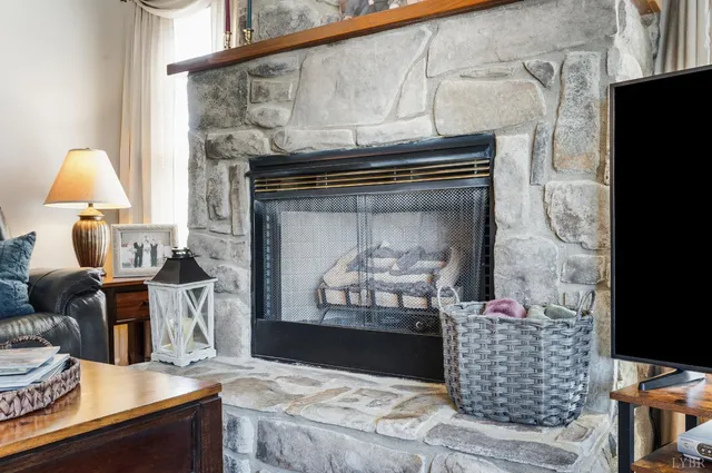 a kitchen with a sink and a stove next to a window