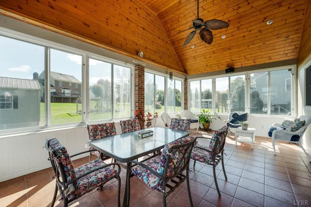 a view of room with hardwood floor and hallway
