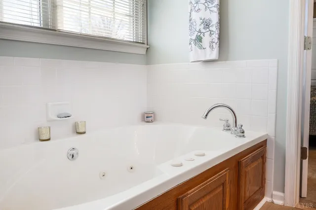 a living room with furniture fireplace and a flat screen tv