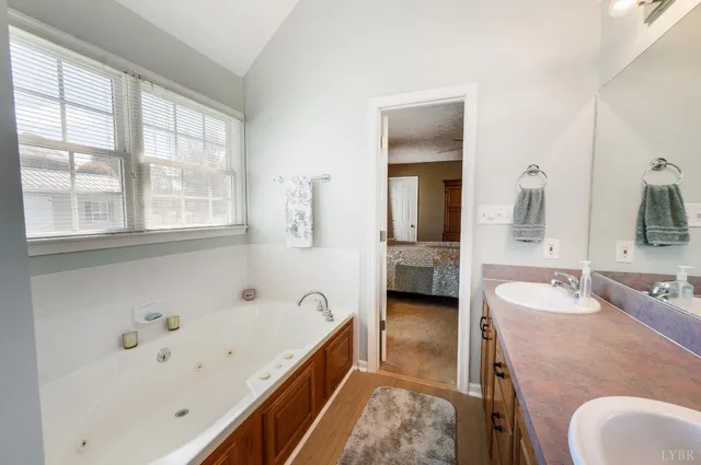 a bathroom with a sink and vanity