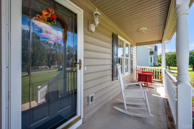 an aerial view of residential house with pool and yard