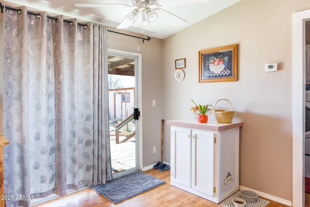 a room that has a bed and a window in it