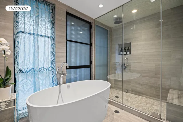 a bathroom with a sink a mirror and a bathtub