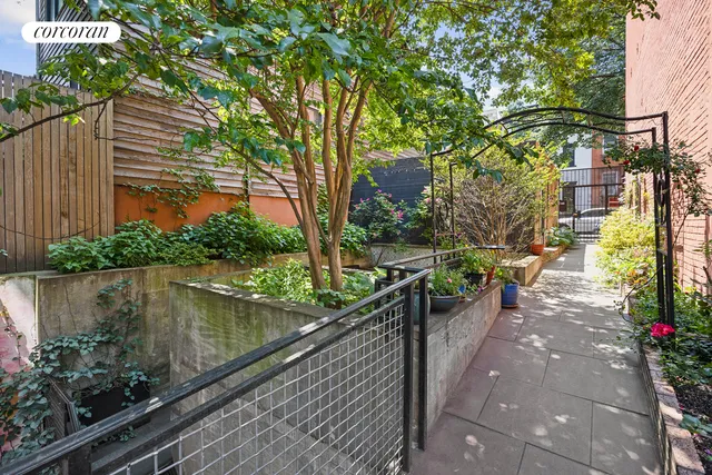 a view of balcony with wooden floor and lake view
