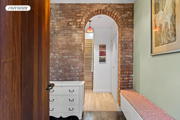 an entrance to house with yard