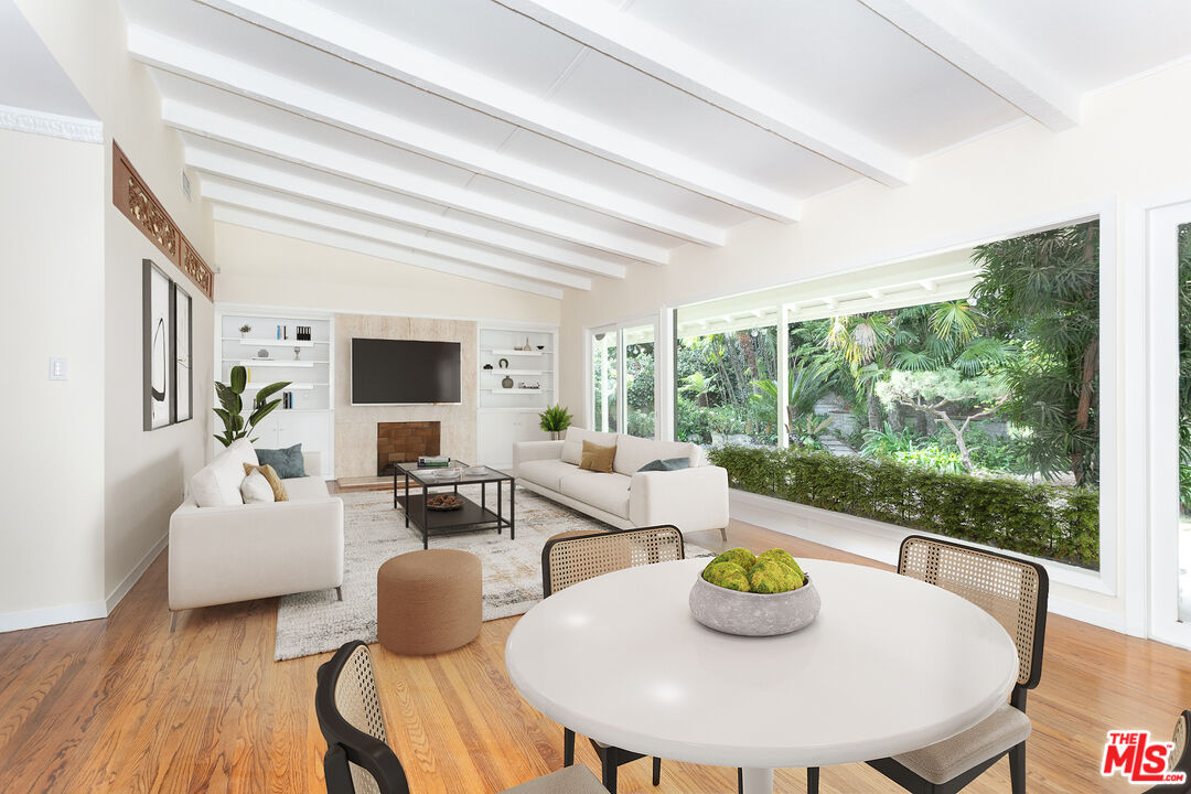 a living room with furniture and a table
