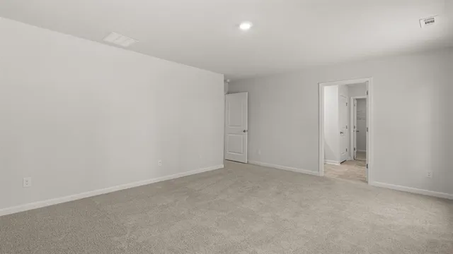 an empty room with an entryway