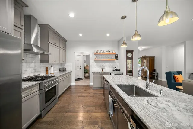 a bed room with a bed and a large window