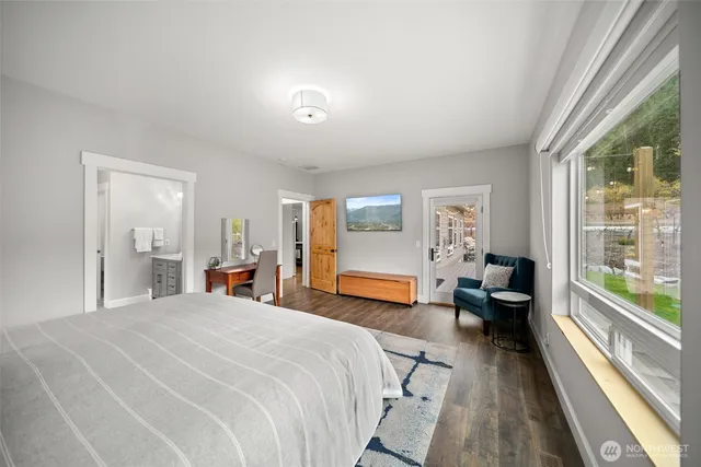 a bedroom with a bed and a cabinets