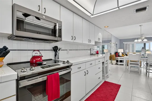 a living room with furniture fireplace and a flat screen tv