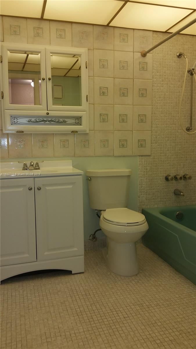 West Perrine Miami, FL 33157 - Photo 15 of 25 a bathroom with a toilet and a shower