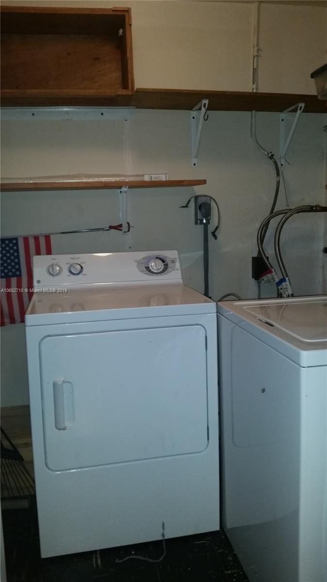 West Perrine Miami, FL 33157 - Photo 18 of 25 a utility room with dryer and washer