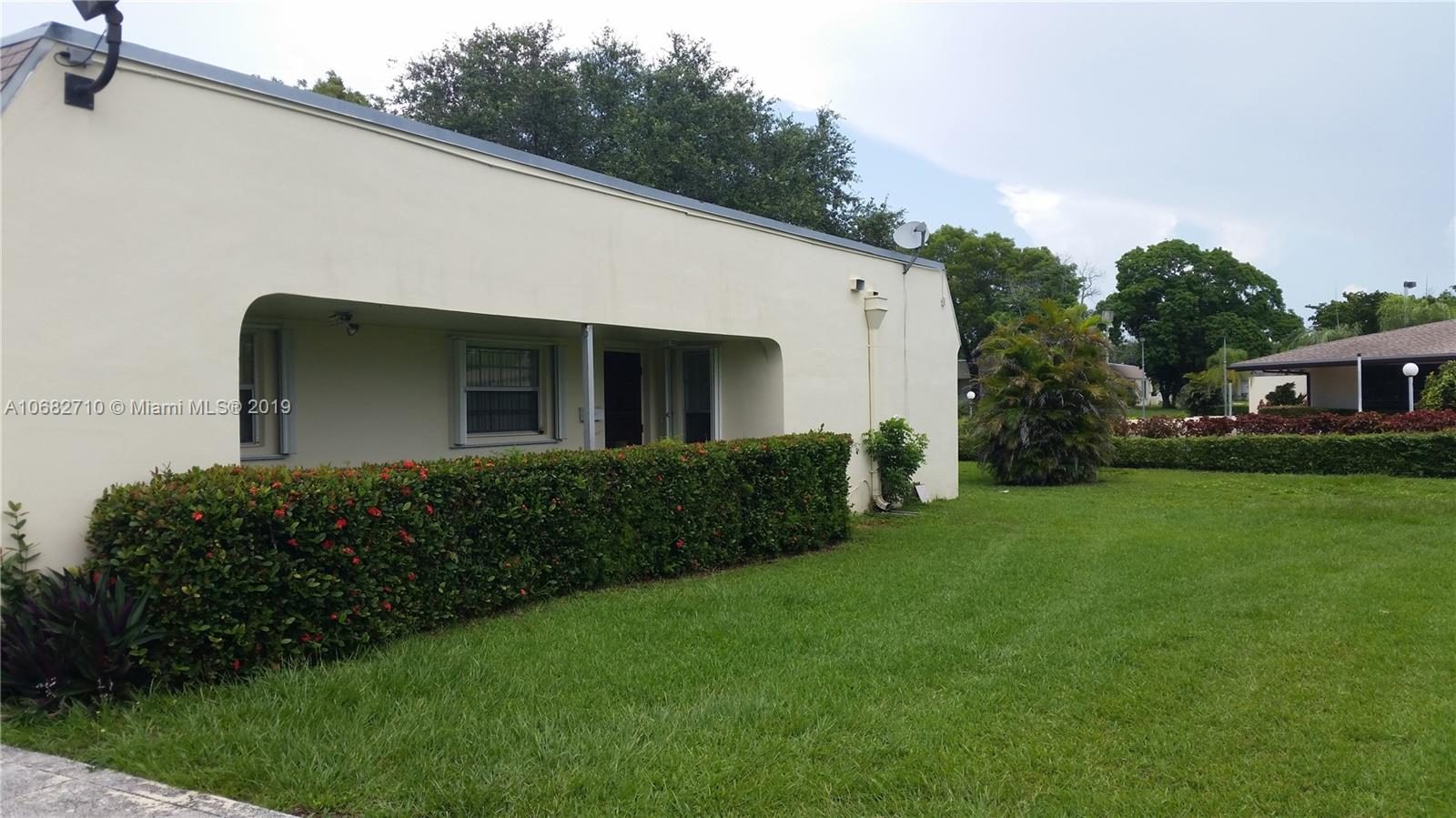 West Perrine Miami, FL 33157 - Photo 2 of 25 a view of a house with backyard and garden