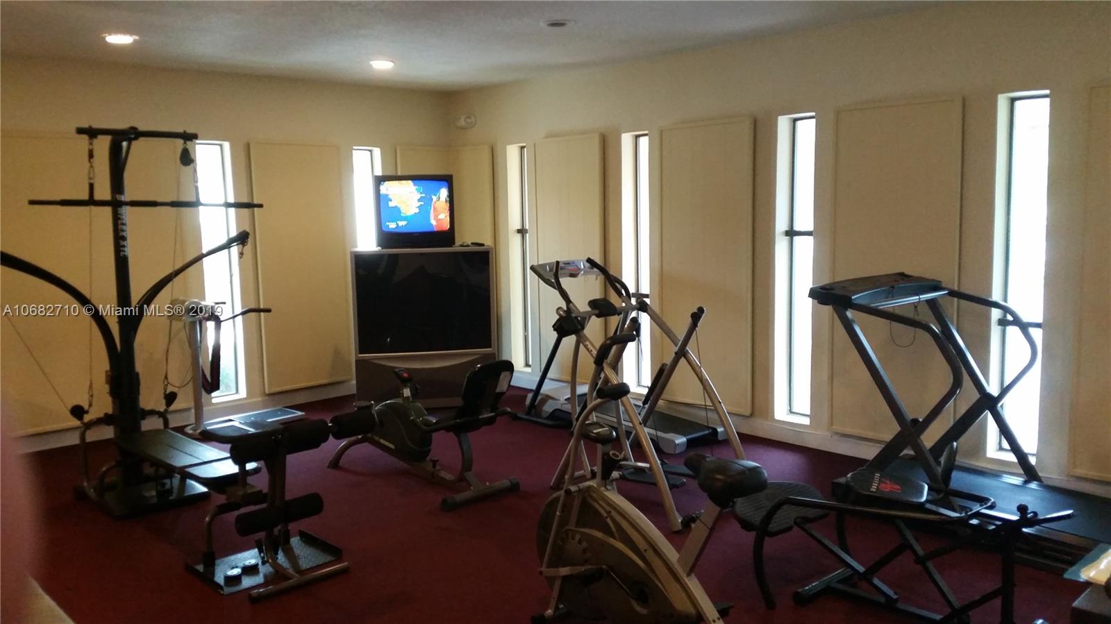 West Perrine Miami, FL 33157 - Photo 25 of 25 a room with gym equipment and windows