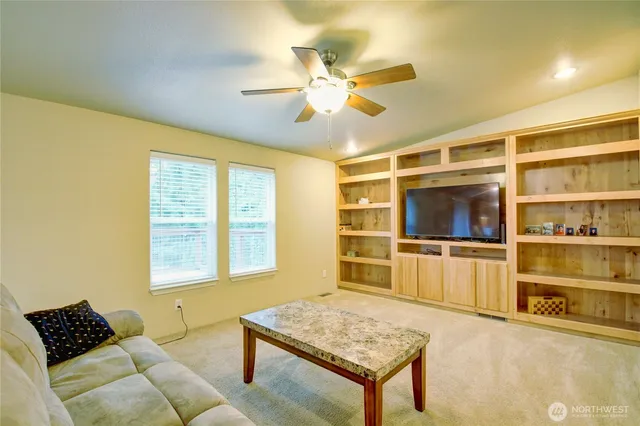 a view of a bedroom with cabinet and door