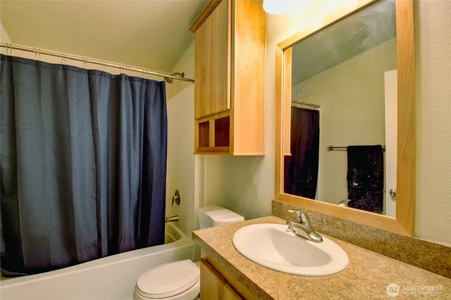 a view of room with gym equipment