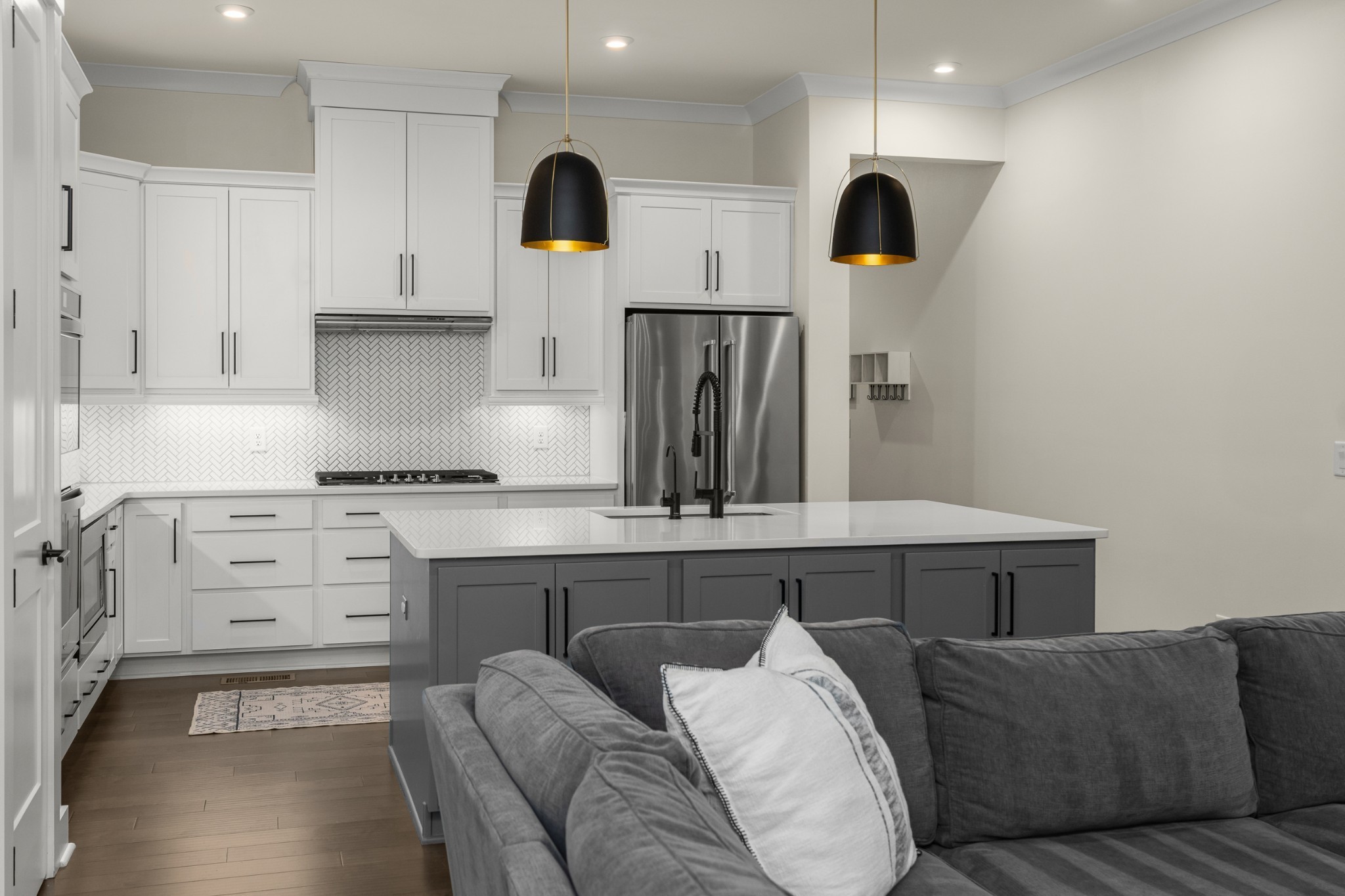 454 Cardel Lane Franklin, TN 37064 - Photo 21 of 53 a living room with furniture and kitchen view