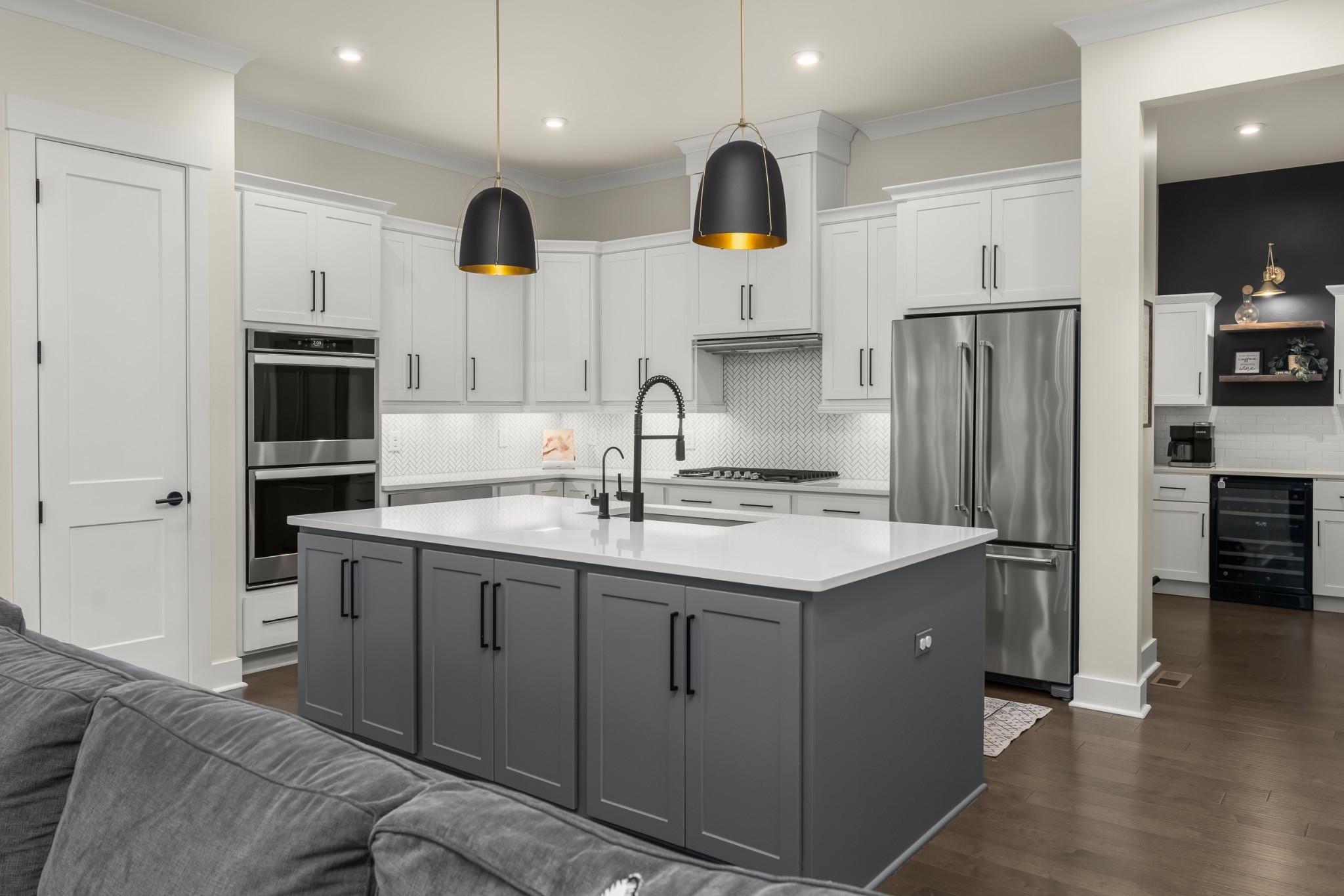454 Cardel Lane Franklin, TN 37064 - Photo 25 of 53 a kitchen with stainless steel appliances a sink and a refrigerator