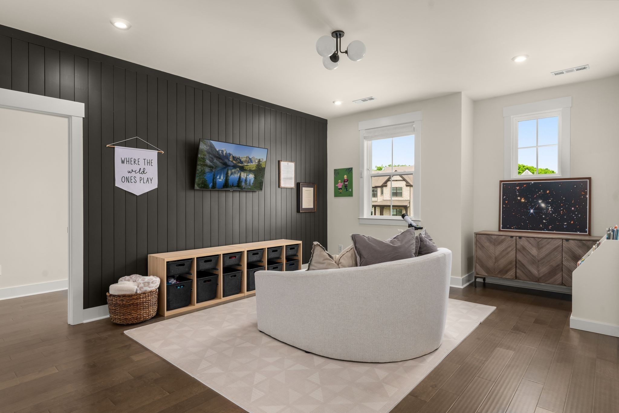 454 Cardel Lane Franklin, TN 37064 - Photo 27 of 53 a living room with furniture and a flat screen tv
