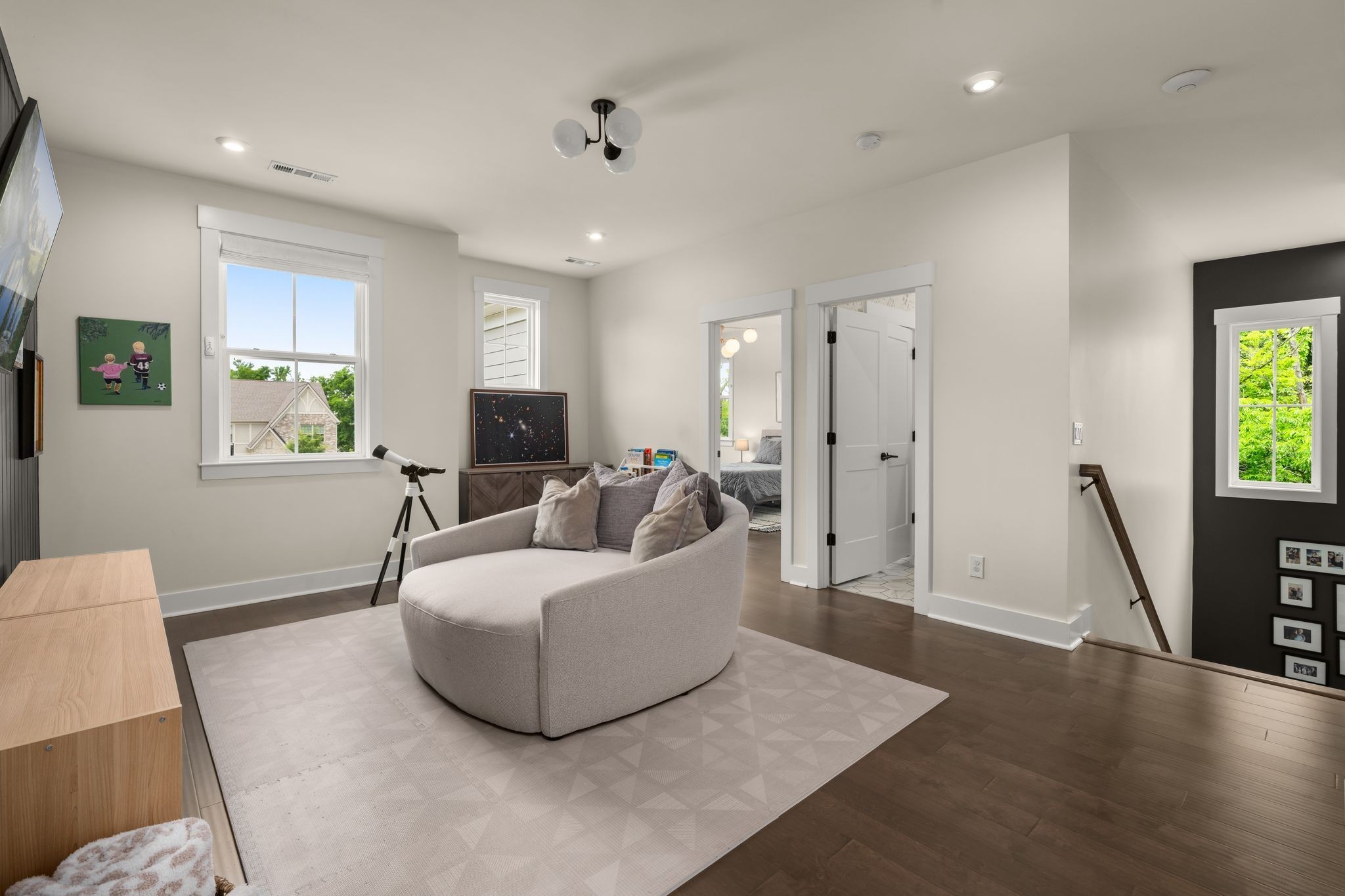454 Cardel Lane Franklin, TN 37064 - Photo 28 of 53 a living room with furniture and a flat screen tv