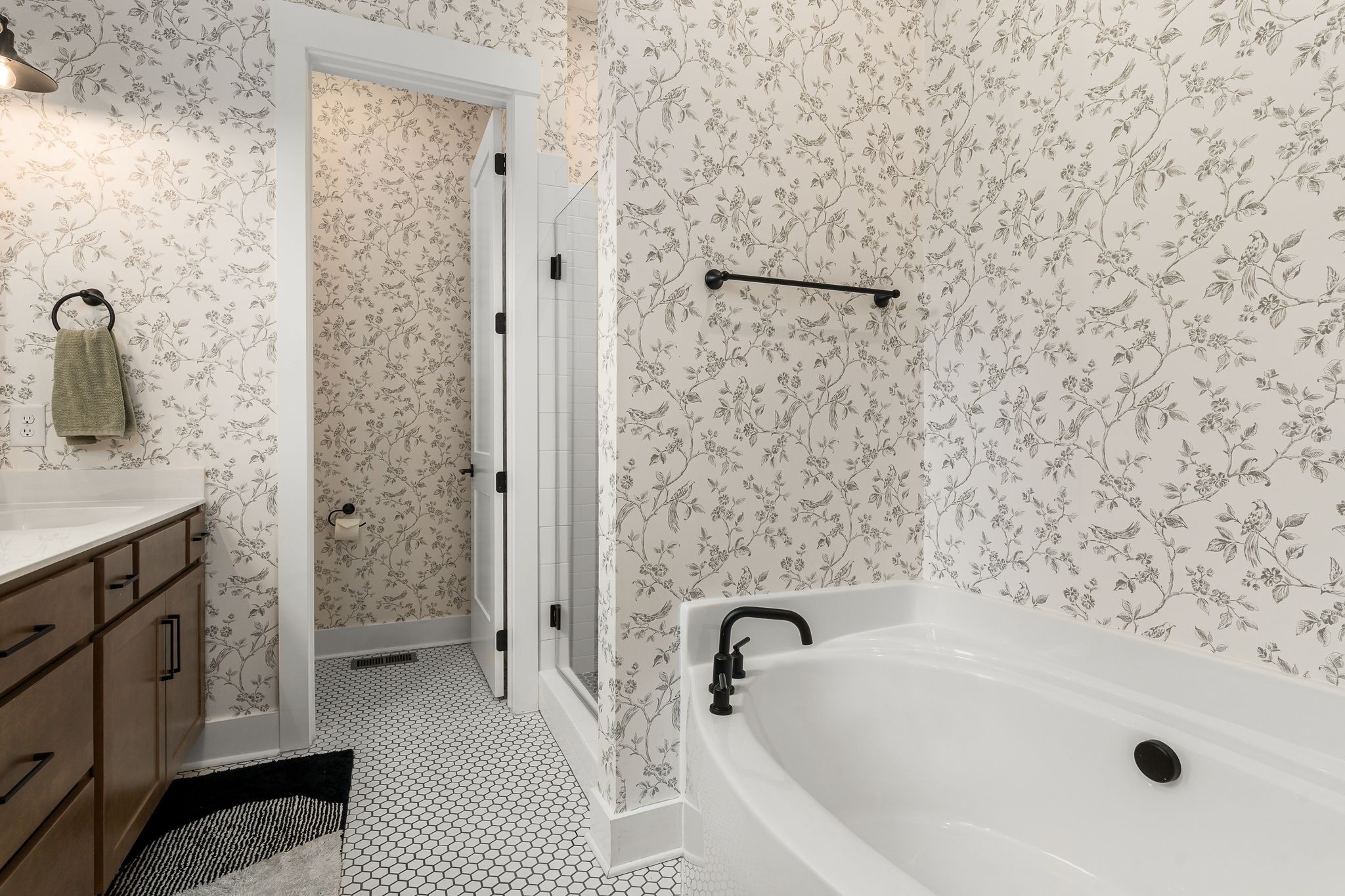 454 Cardel Lane Franklin, TN 37064 - Photo 31 of 53 a bathroom with a tub sink vanity and shower