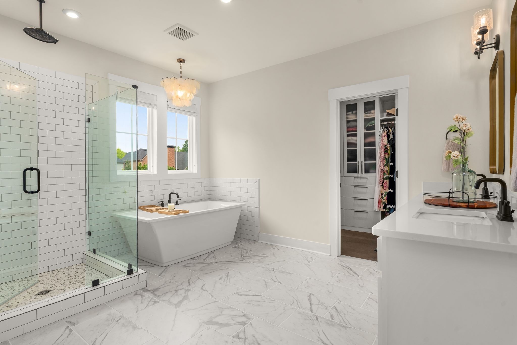 454 Cardel Lane Franklin, TN 37064 - Photo 41 of 53 a bathroom with a tub sink and mirror