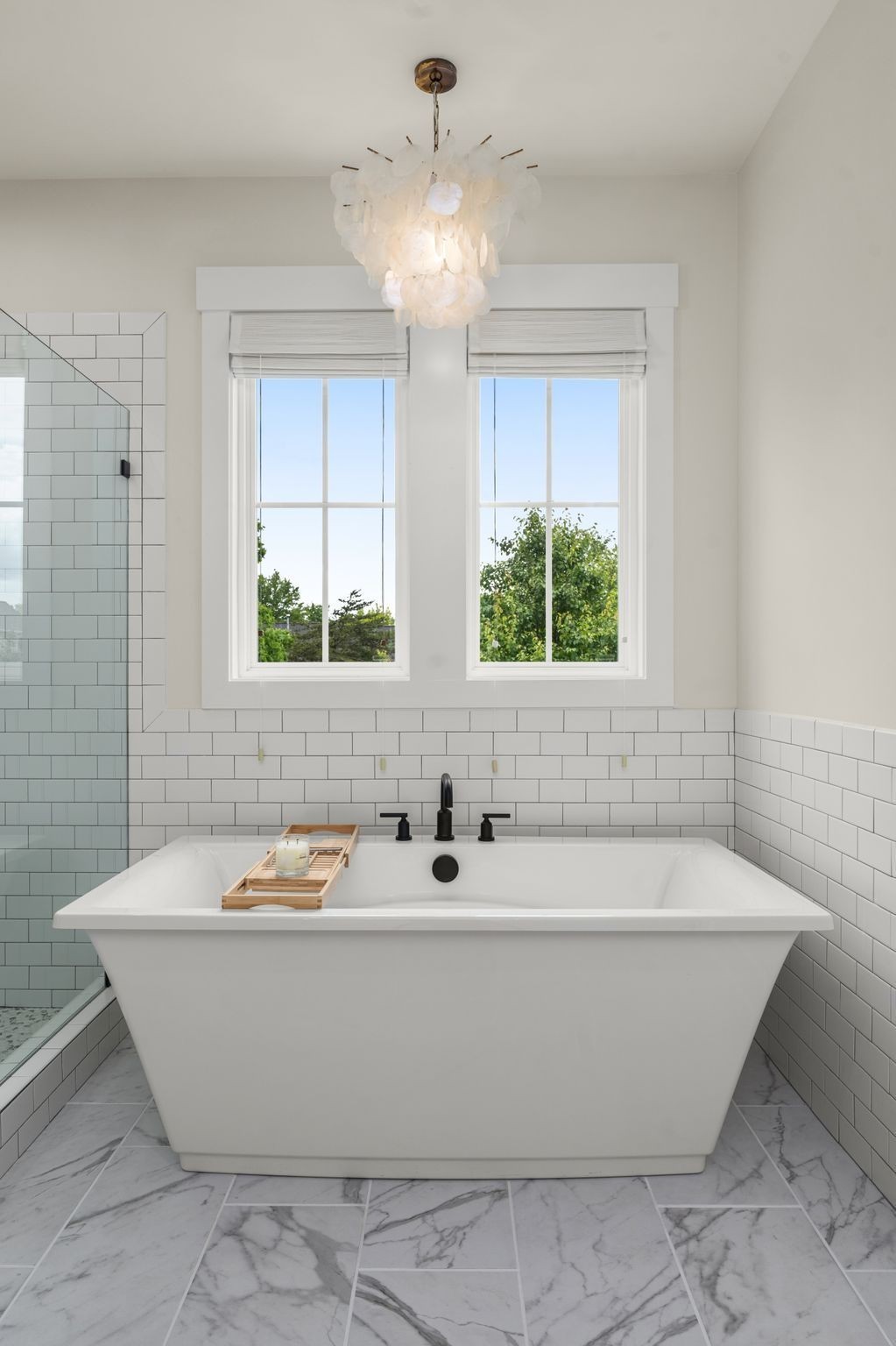 454 Cardel Lane Franklin, TN 37064 - Photo 44 of 53 a bathroom with a bathtub and window