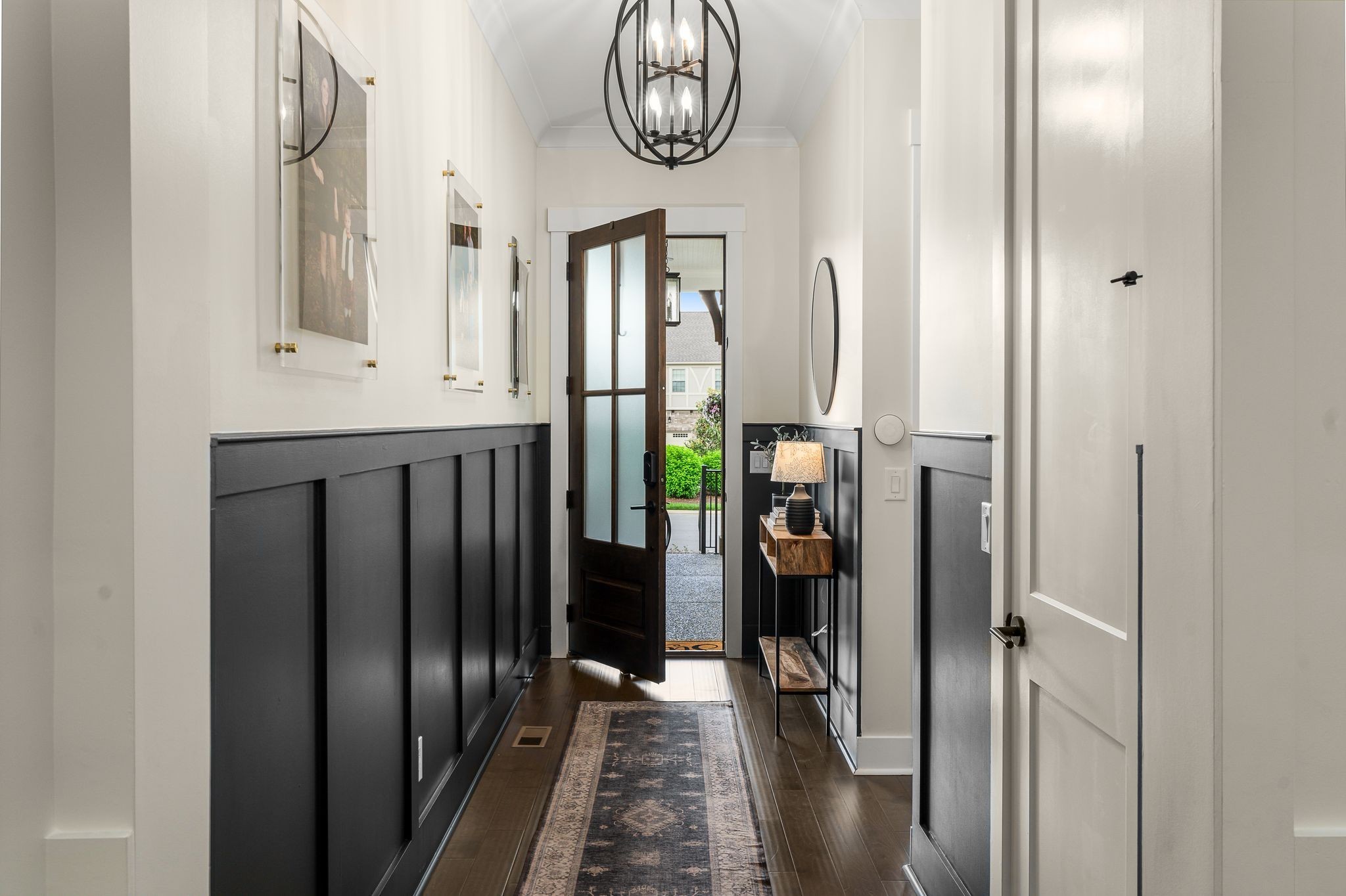 454 Cardel Lane Franklin, TN 37064 - Photo 7 of 53 a view of a hallway with wooden floor